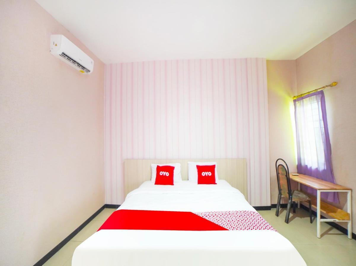 Oyo 91283 Sg Premium Guest House 棉兰 外观 照片